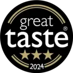 A black circular badge with gold trim displaying the words "great taste" and "2024", three gold stars, and a registered trademark symbol.