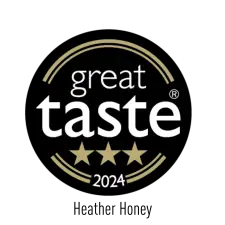 A black circular badge with the words "great taste" in white, three gold stars below, and "2024" at the bottom, indicating a 2024 Great Taste award.
