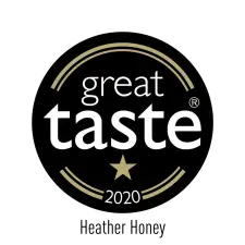 A round black and gold badge with the words "great taste" and a star below, along with "2020" at the bottom, indicating a Great Taste Award from that year.